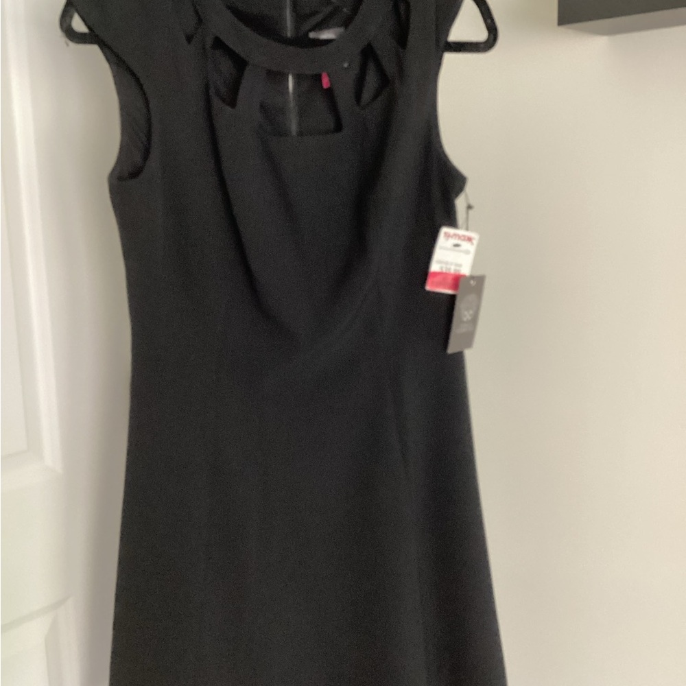 Never worn with tags on black dress
